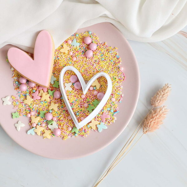 Koekjes bakken en decoreren met uitsteekvormpjes fondantstempels en koekstempels van het koekatelier